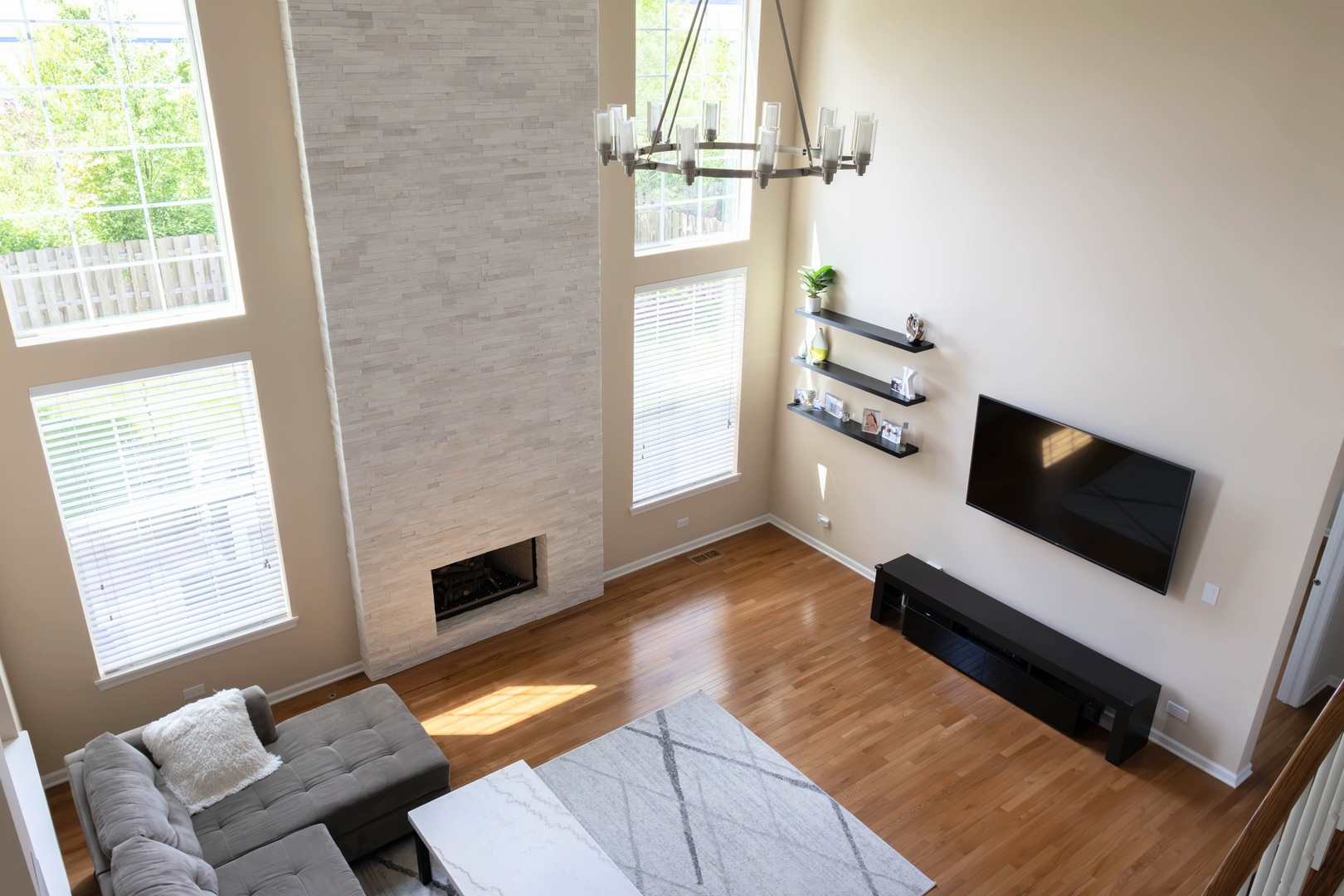 421 Post Oak Circle West Chicago, IL 60185 - Photo 7 of 22 a view of a livingroom with furniture and a fireplace
