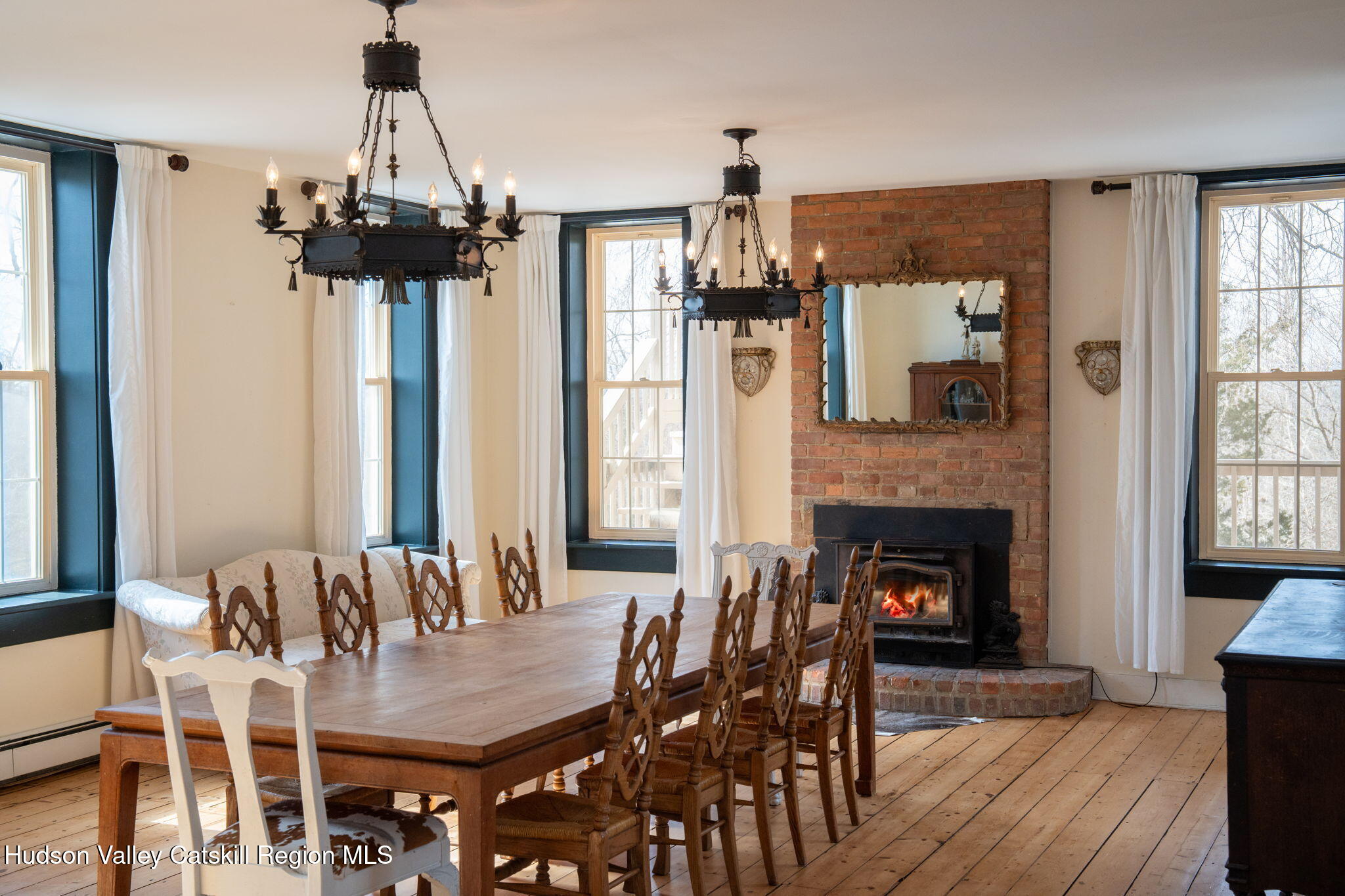 2125 Highway 385 Athens, NY 12015 - Photo 13 of 50 a dining room with furniture window and wooden floor