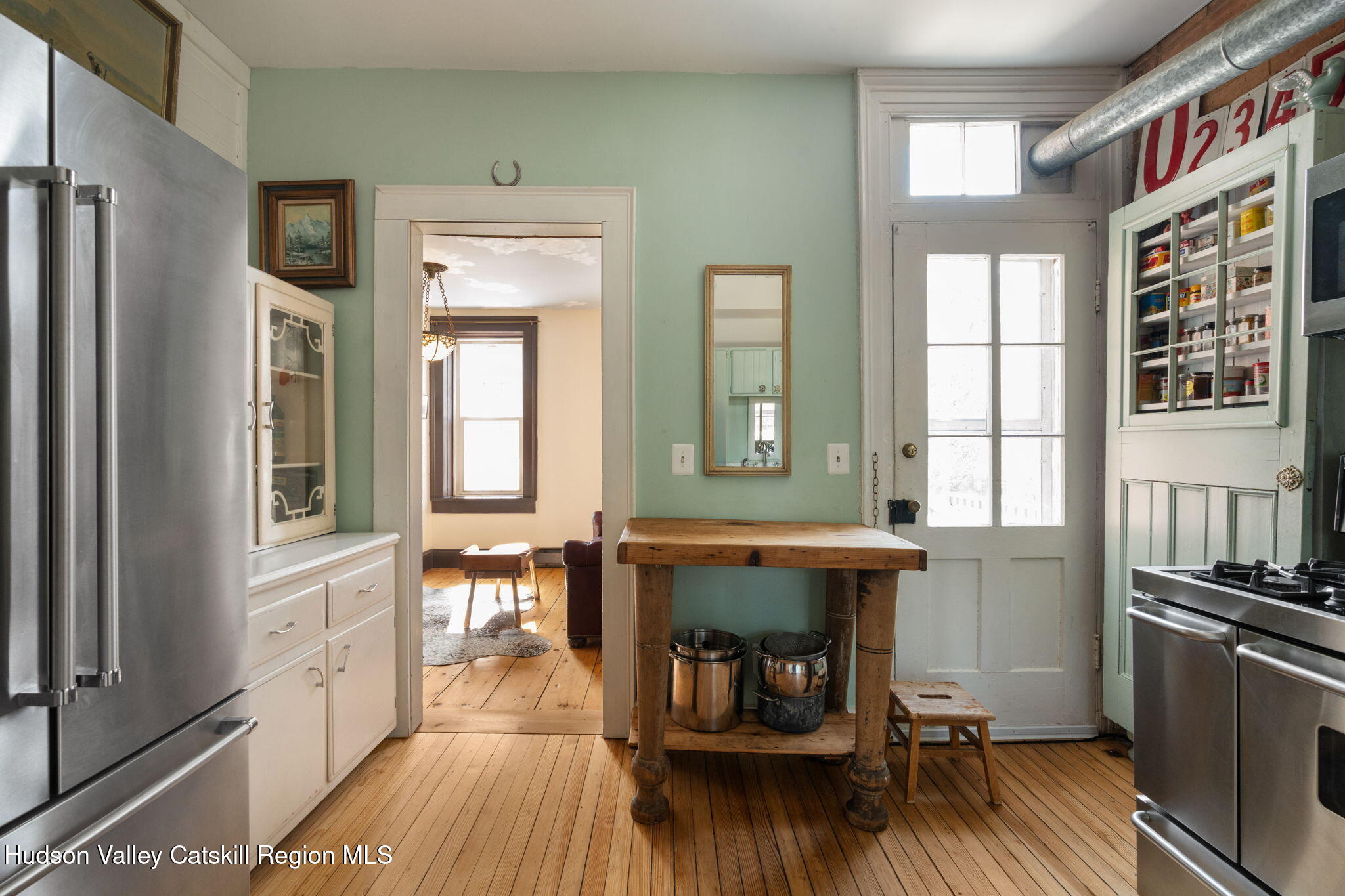 2125 Highway 385 Athens, NY 12015 - Photo 19 of 50 a living room with furniture and a fireplace