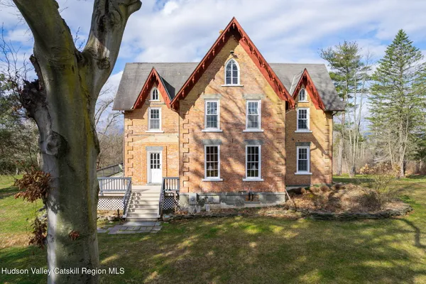 front view of a house with a yard
