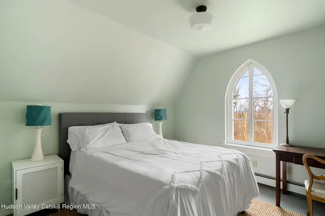 a view of bedroom with window