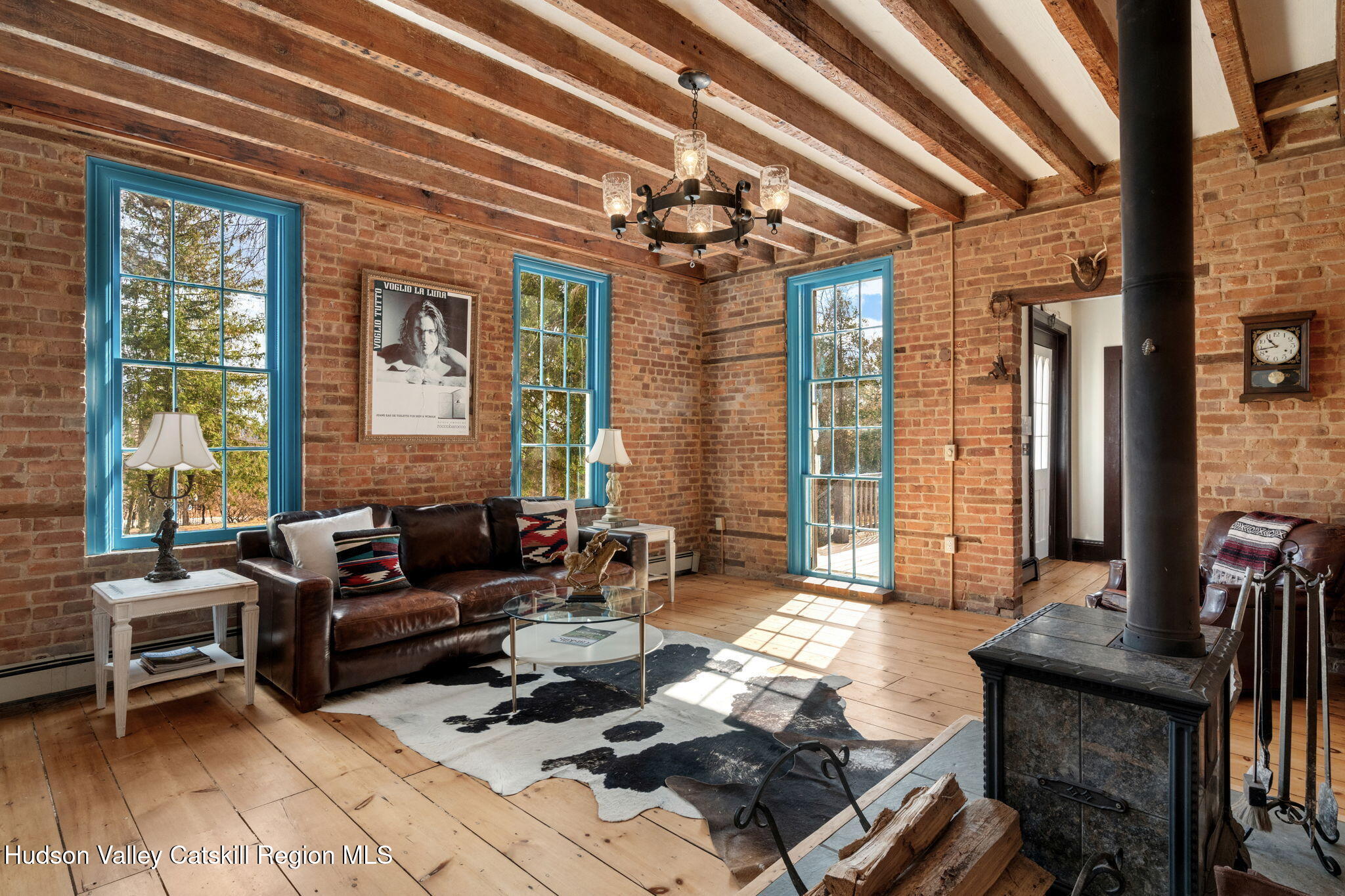 2125 Highway 385 Athens, NY 12015 - Photo 9 of 50 a living room with furniture and large windows