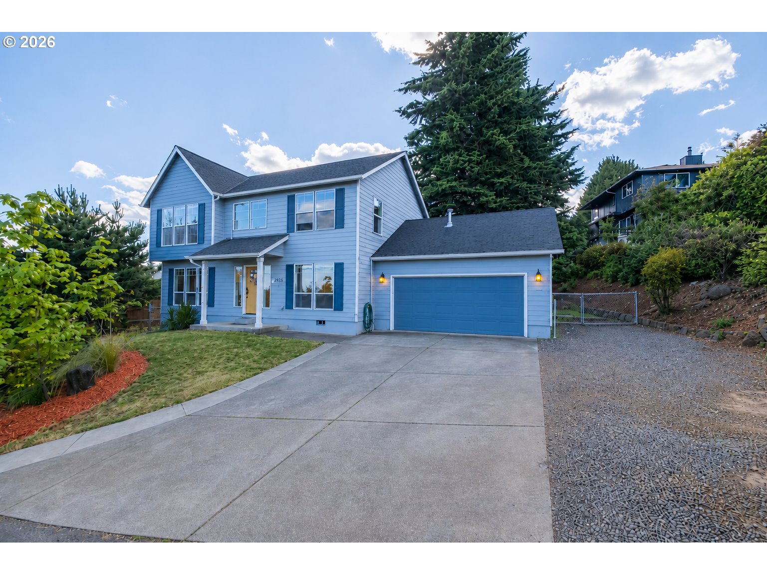 2925 Doaks Ferry Road Northwest Salem, OR 97304 - Photo 1 of 47 a front view of a house with a yard and garage