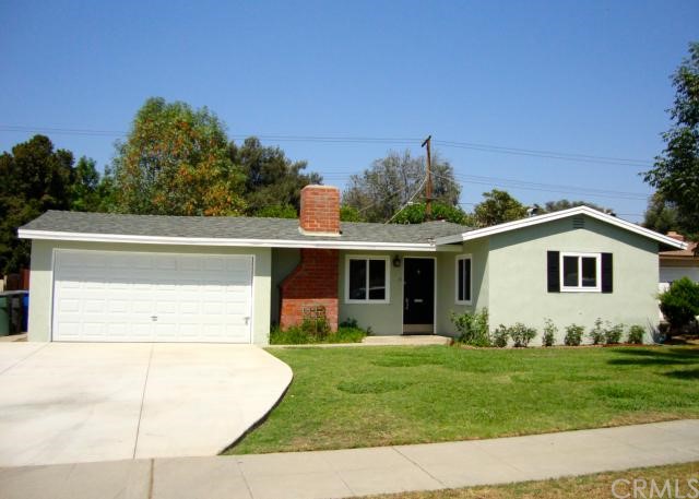 4075 Madrona Road Riverside, CA 92504 - Photo 1 of 1 a view of a house with a yard