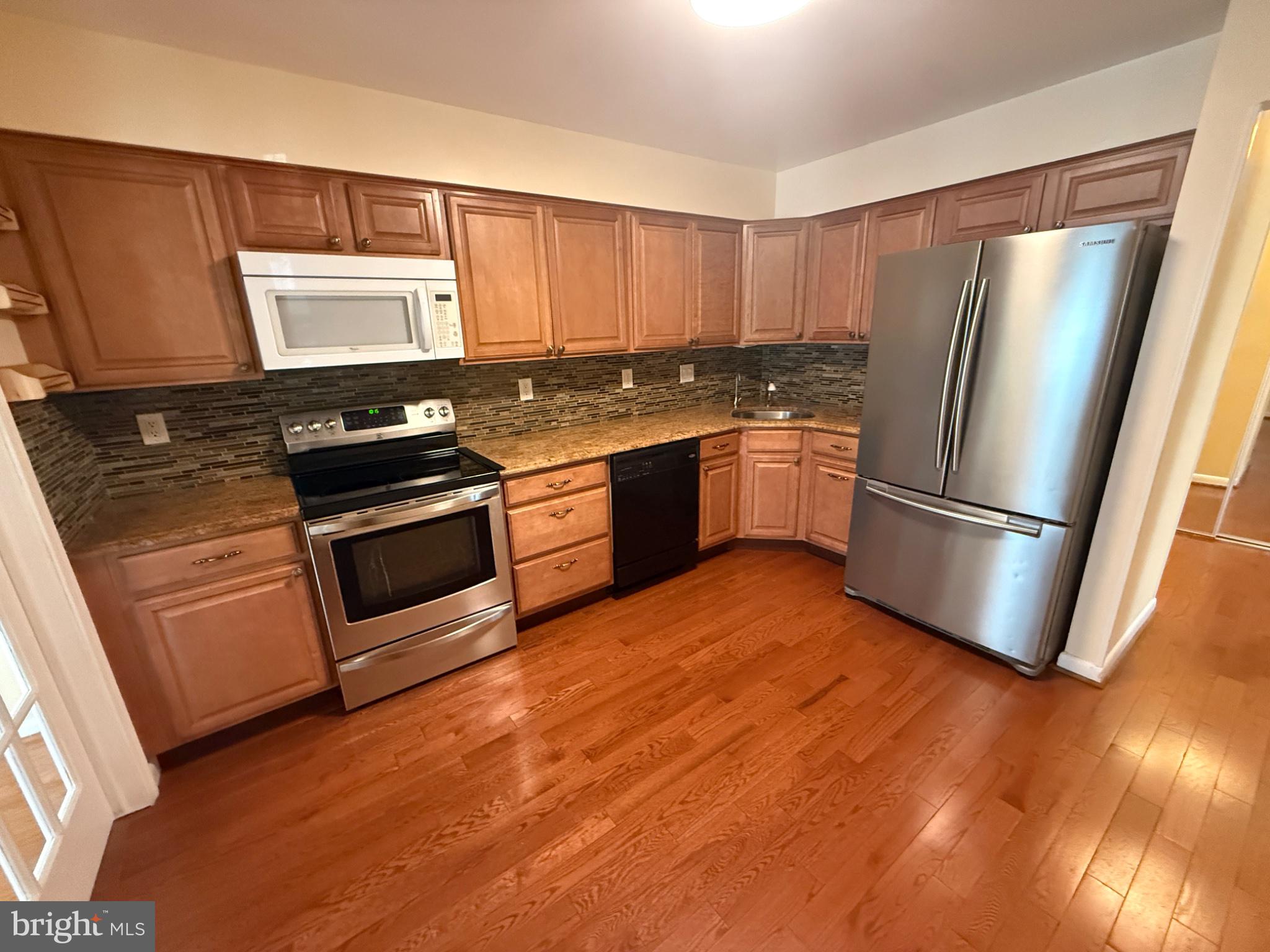 2101 Woodbox Lane, Unit B Baltimore, MD 21209 - Photo 8 of 21 Modern kitchen with sleek finishes.