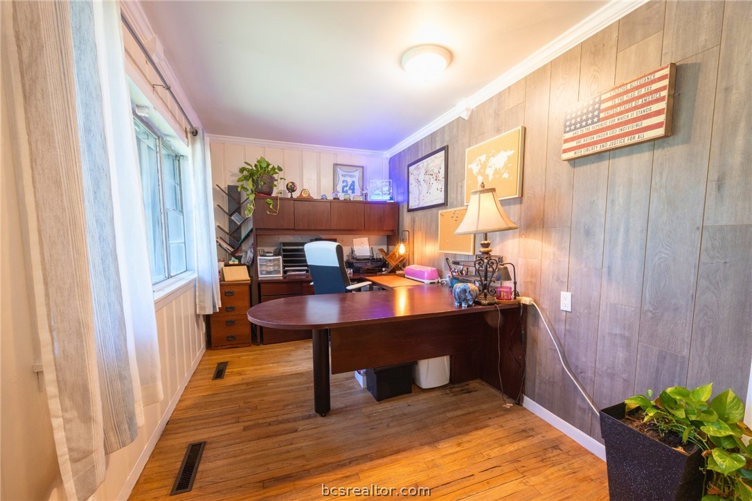 749 South Cass Street Centerville, TX 75833 - Photo 22 of 30 a view of a workspace with furniture and a window