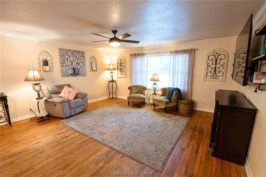 749 South Cass Street Centerville, TX 75833 - Photo 4 of 30 a living room with furniture and a large window
