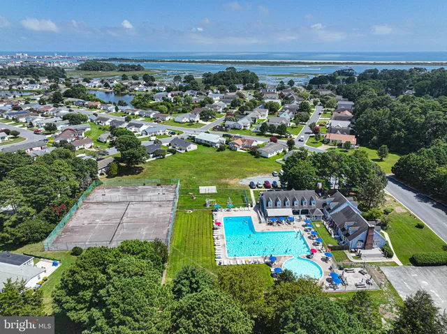 an aerial view of a house with a garden