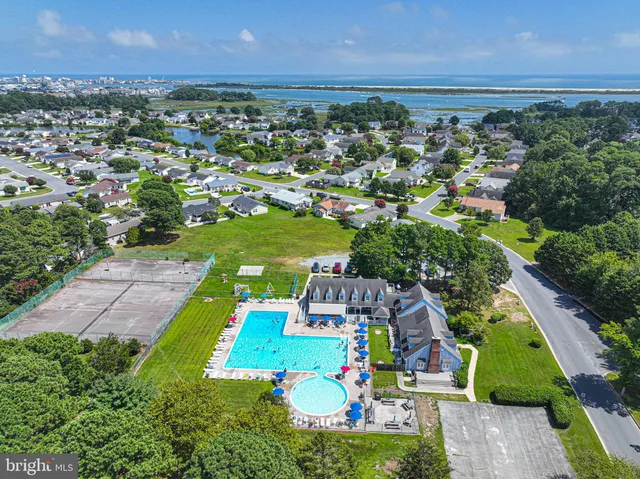 an aerial view of a house with a garden