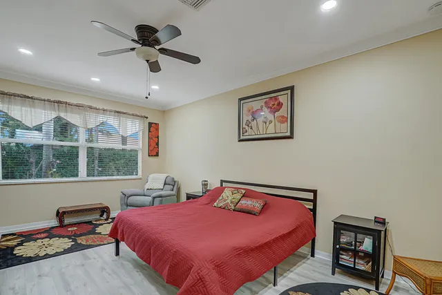 a bed room with a bed and a window