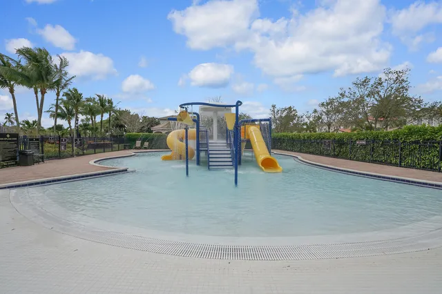 a living room with fireplace furniture and a flat screen tv