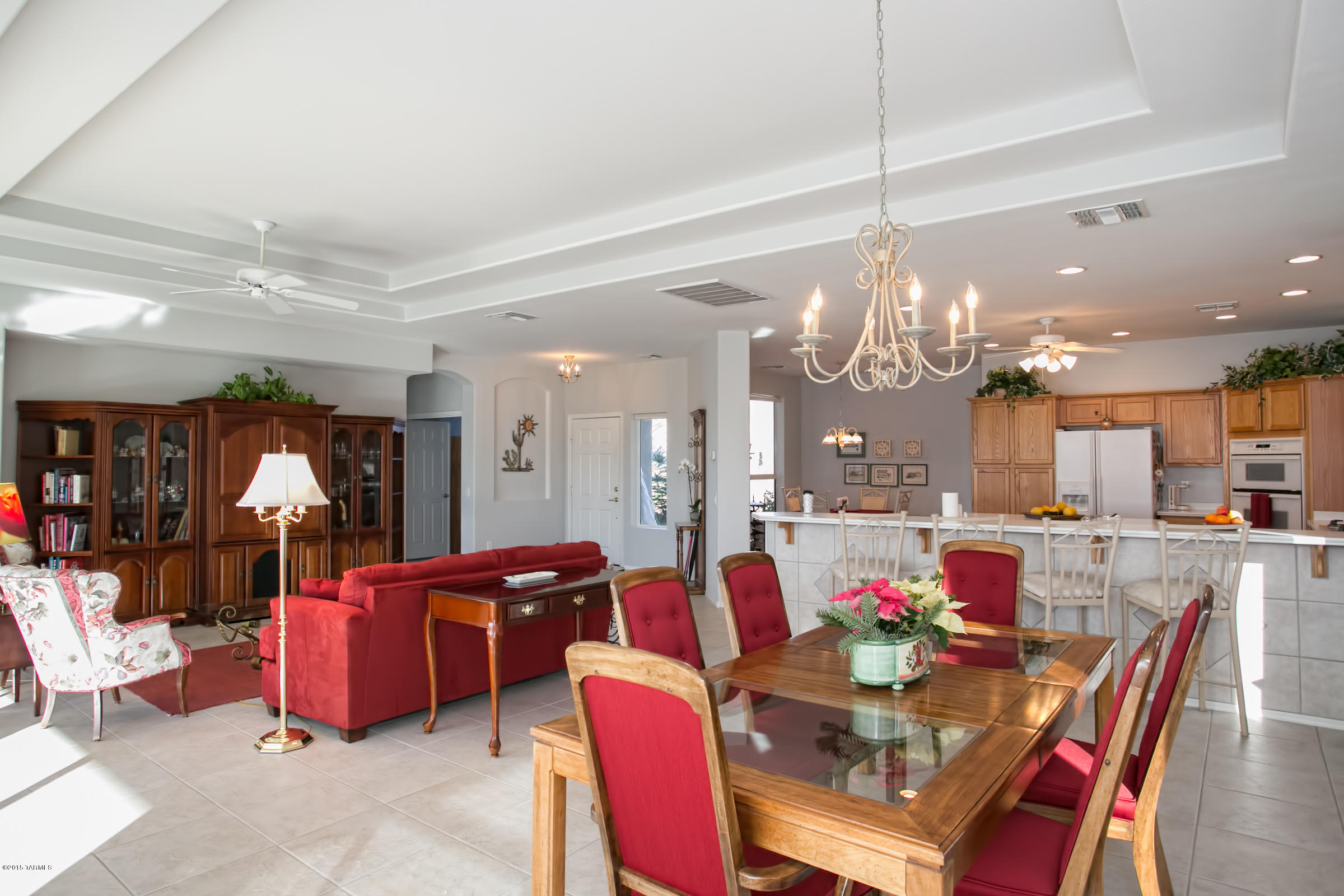 62419 East Northwood Road Tucson, AZ 85739 - Photo 30 of 30 a view of a dining area with furniture and chandelier