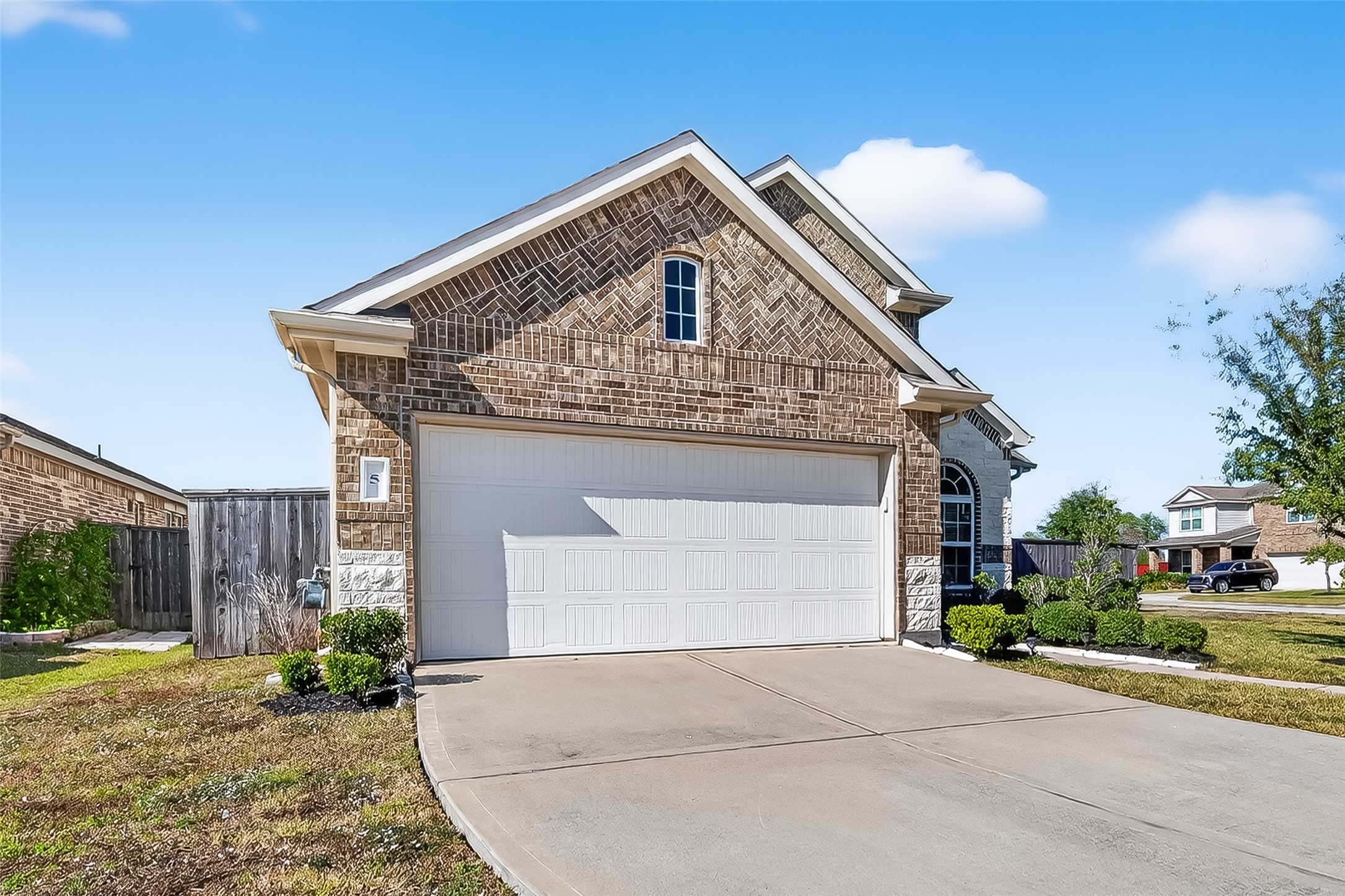 5 Lucas Chase Court Manvel, TX 77578 - Photo 2 of 50 Secure Living. Enjoy the convenience of a spacious garage and the peace of mind of residing within a premiere, gated community.