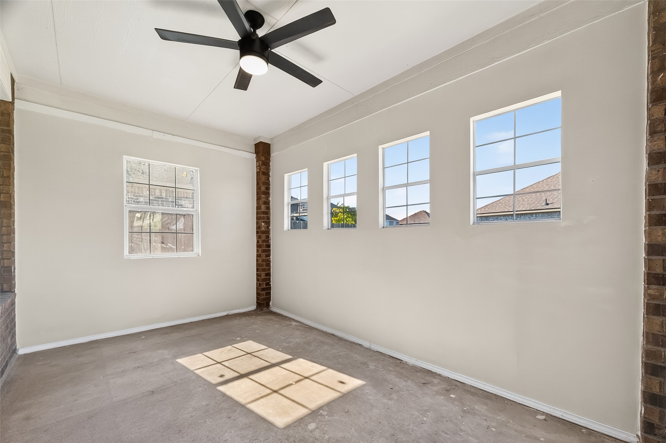 5 Lucas Chase Court Manvel, TX 77578 - Photo 35 of 50 Seller has installed 4 new windows in this enclosed patio, bringing in even more natural light and fresh potential to this versatile space.