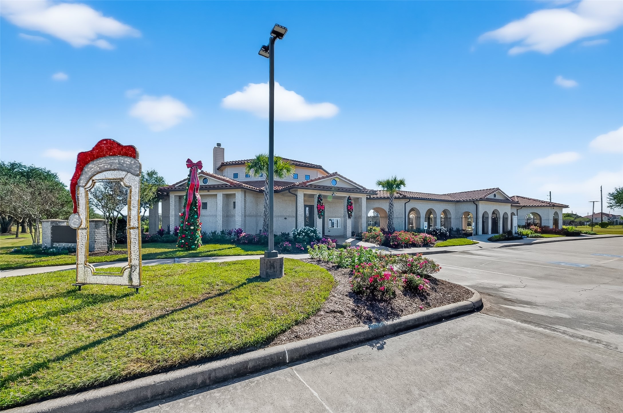 5 Lucas Chase Court Manvel, TX 77578 - Photo 43 of 50 Your resort awaits! Enjoy life at the beautiful community clubhouse, featuring a stunning pool, social spaces, and year-round activities—all set within your gated neighborhood.