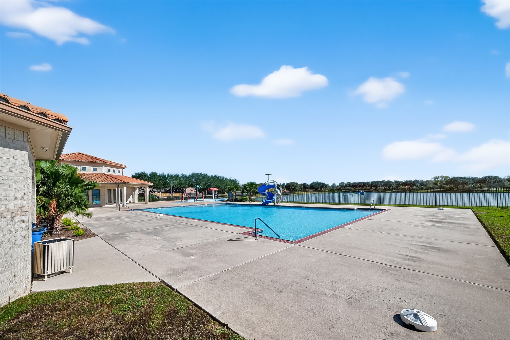 5 Lucas Chase Court Manvel, TX 77578 - Photo 50 of 50 Dive Into Summer! The gorgeous community pool and surrounding lounge area offer the perfect spot to relax and cool off, completing your resort-style living experience.