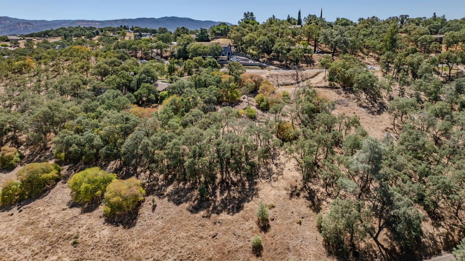 3721 Dunn Road Valley Springs, CA 95252 - Photo 14 of 14 a view of a yard with wooden fence