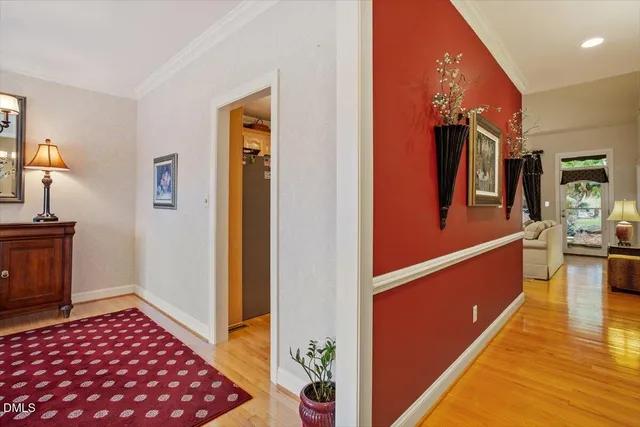 a kitchen with stainless steel appliances granite countertop a refrigerator and a stove