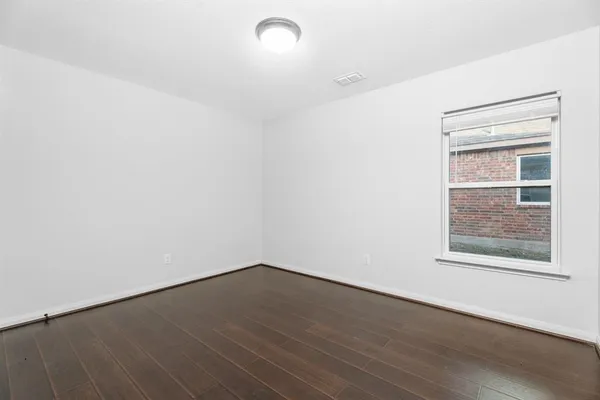 a large kitchen with kitchen island granite countertop a large counter top stainless steel appliances and cabinets