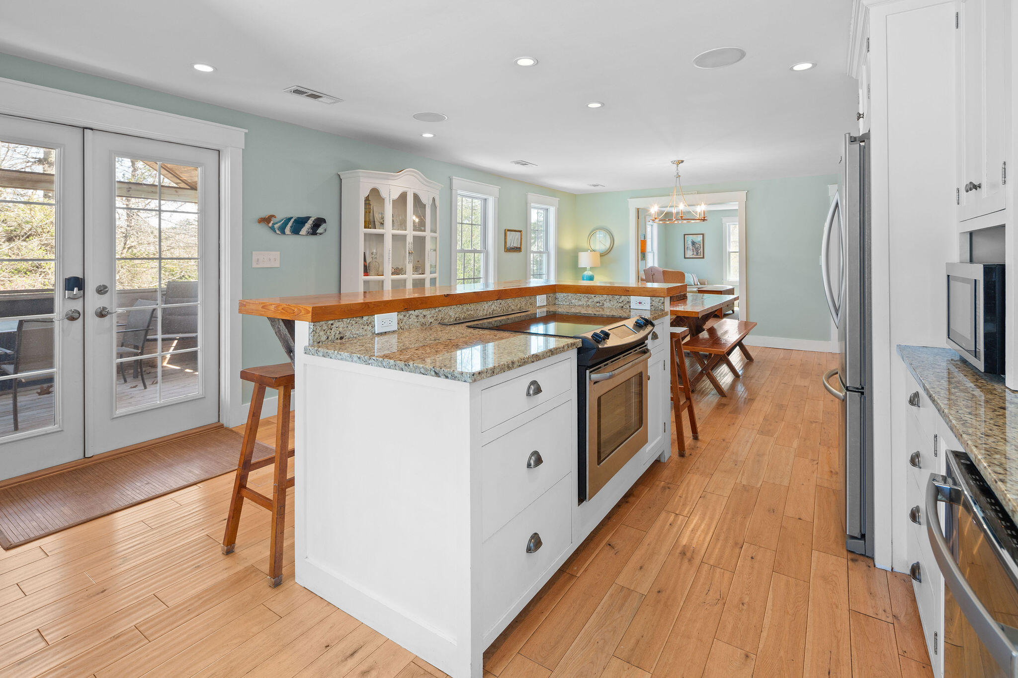 16 Hughes Road Truro, MA 02666 - Photo 12 of 50 a kitchen with stainless steel appliances granite countertop a stove and a refrigerator