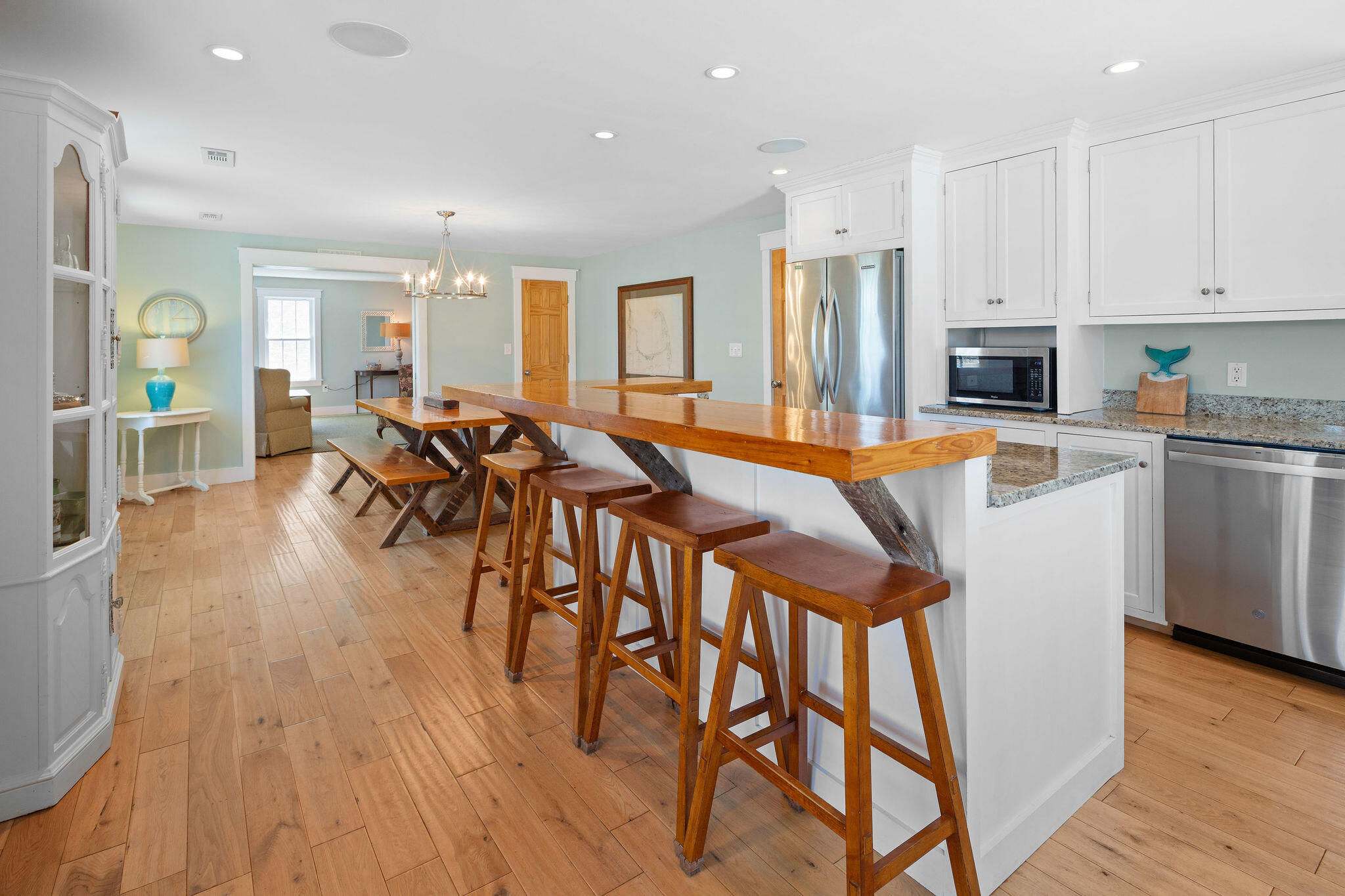 16 Hughes Road Truro, MA 02666 - Photo 13 of 50 a dining room with furniture and wooden floor