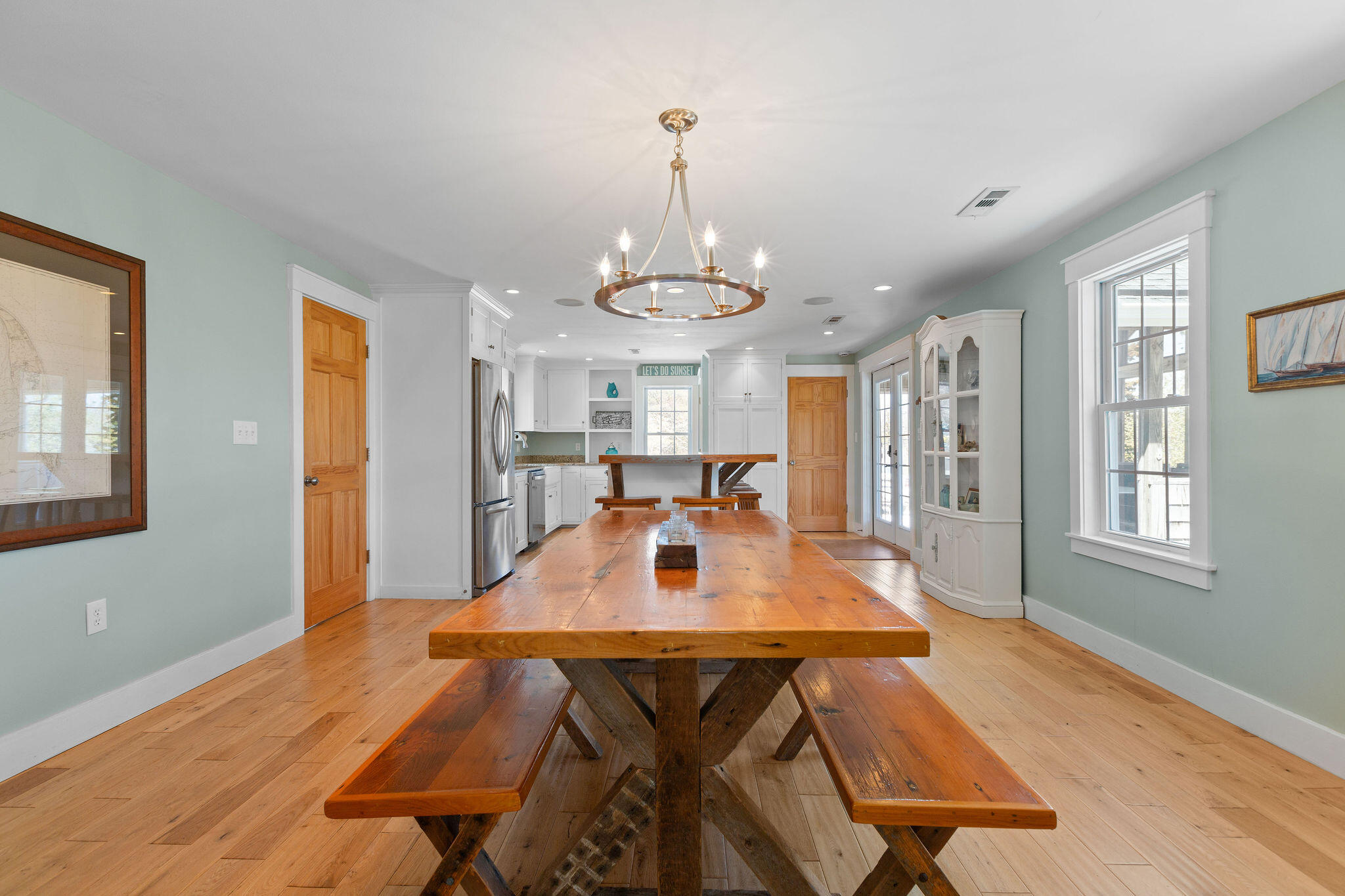 16 Hughes Road Truro, MA 02666 - Photo 19 of 50 a view of a dining room with furniture window and wooden floor