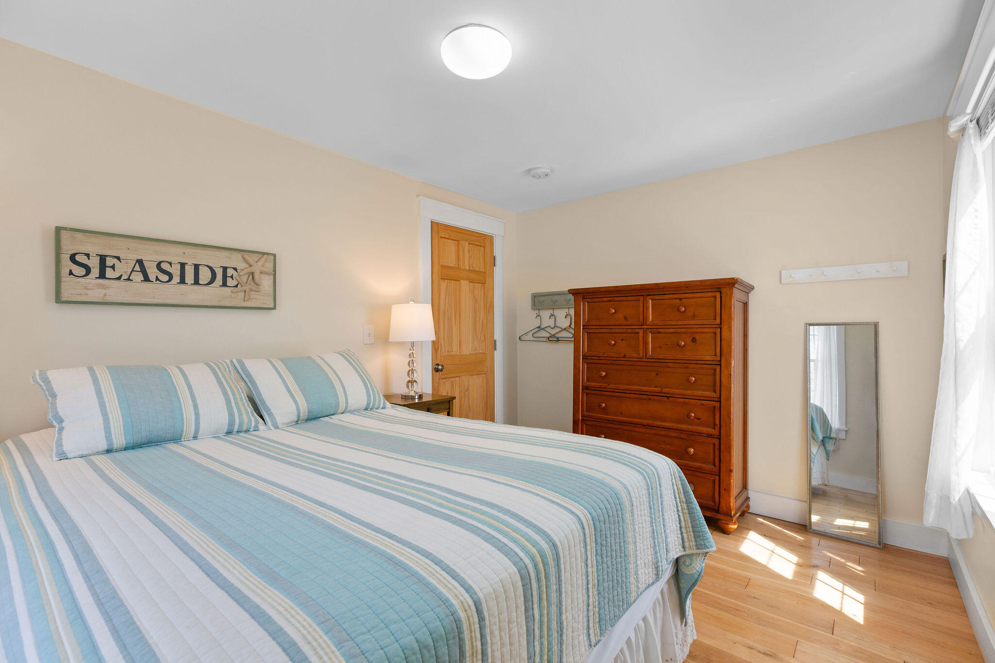 16 Hughes Road Truro, MA 02666 - Photo 24 of 50 a bedroom with a bed and a walk in closet