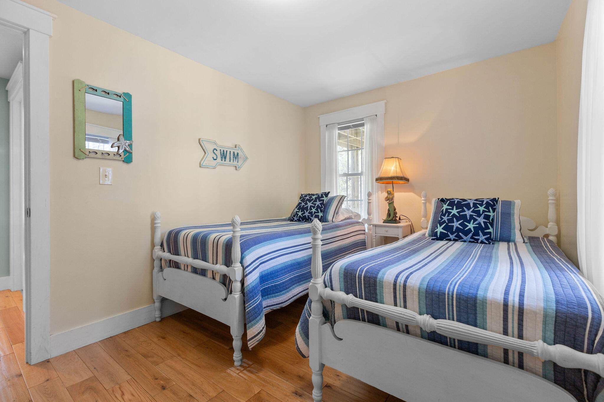 16 Hughes Road Truro, MA 02666 - Photo 26 of 50 a bedroom with furniture and wooden floor