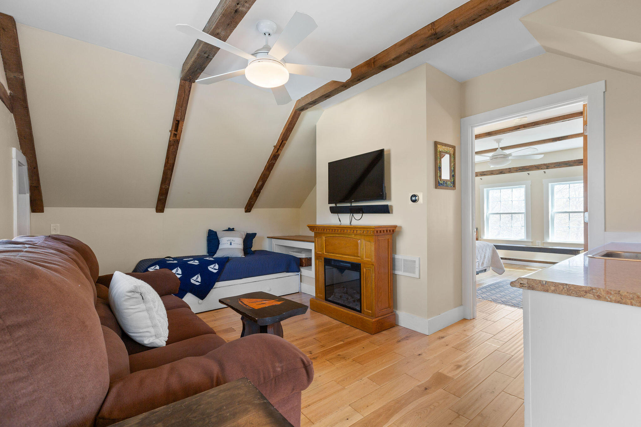 16 Hughes Road Truro, MA 02666 - Photo 29 of 50 a living room with furniture and a flat screen tv