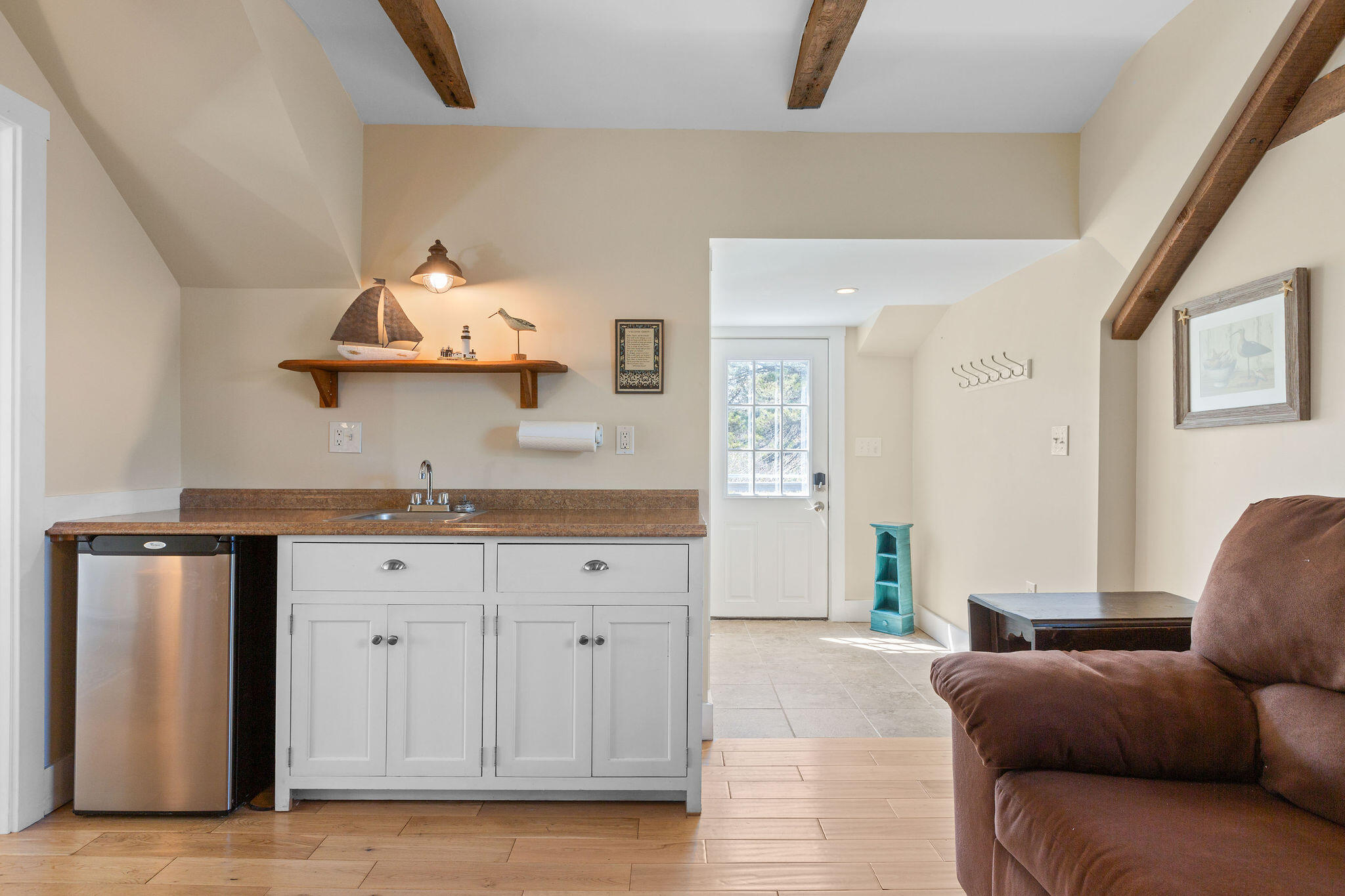 16 Hughes Road Truro, MA 02666 - Photo 31 of 50 a living room with furniture and a window