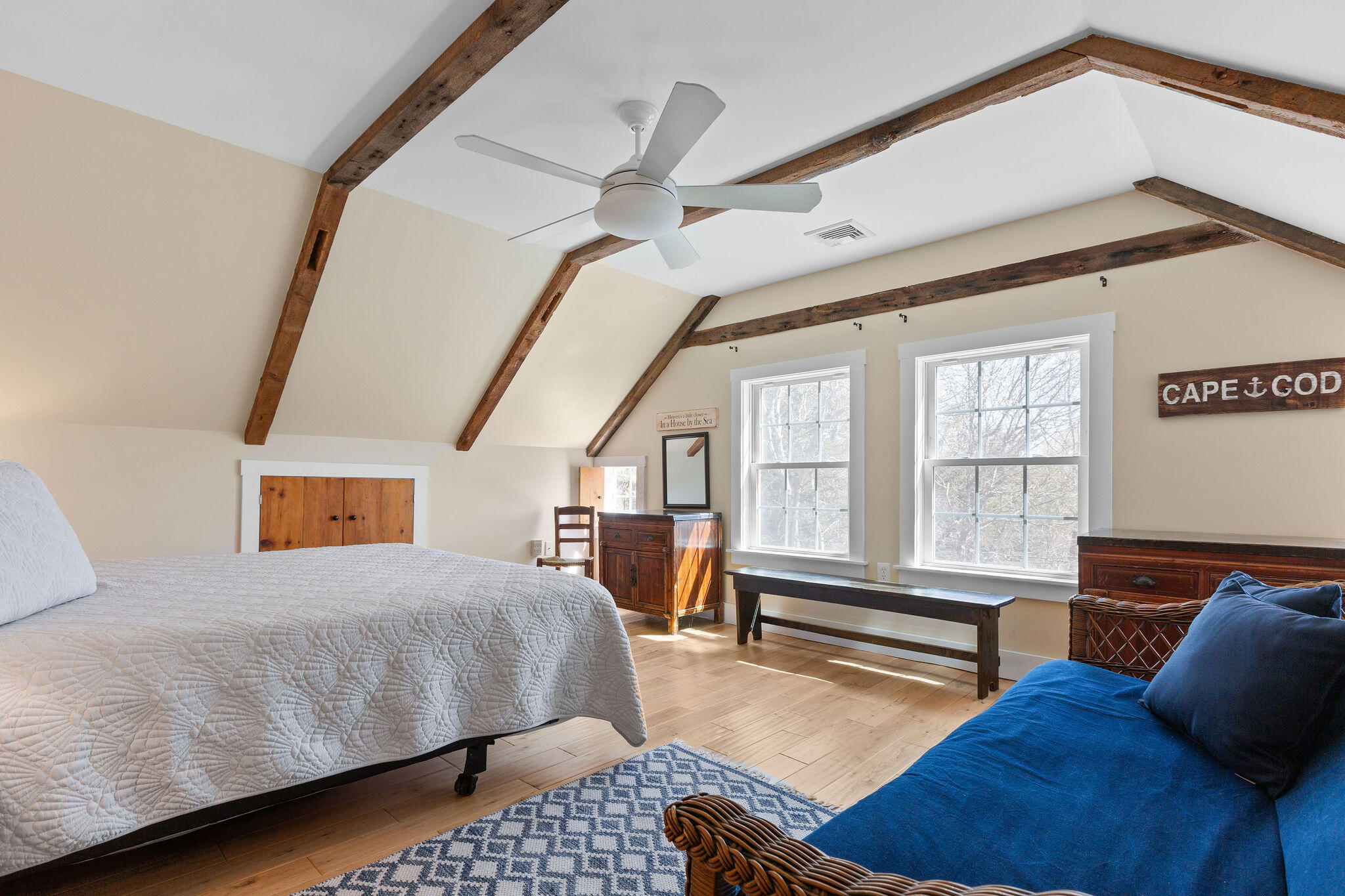 16 Hughes Road Truro, MA 02666 - Photo 33 of 50 a bedroom with furniture and a window