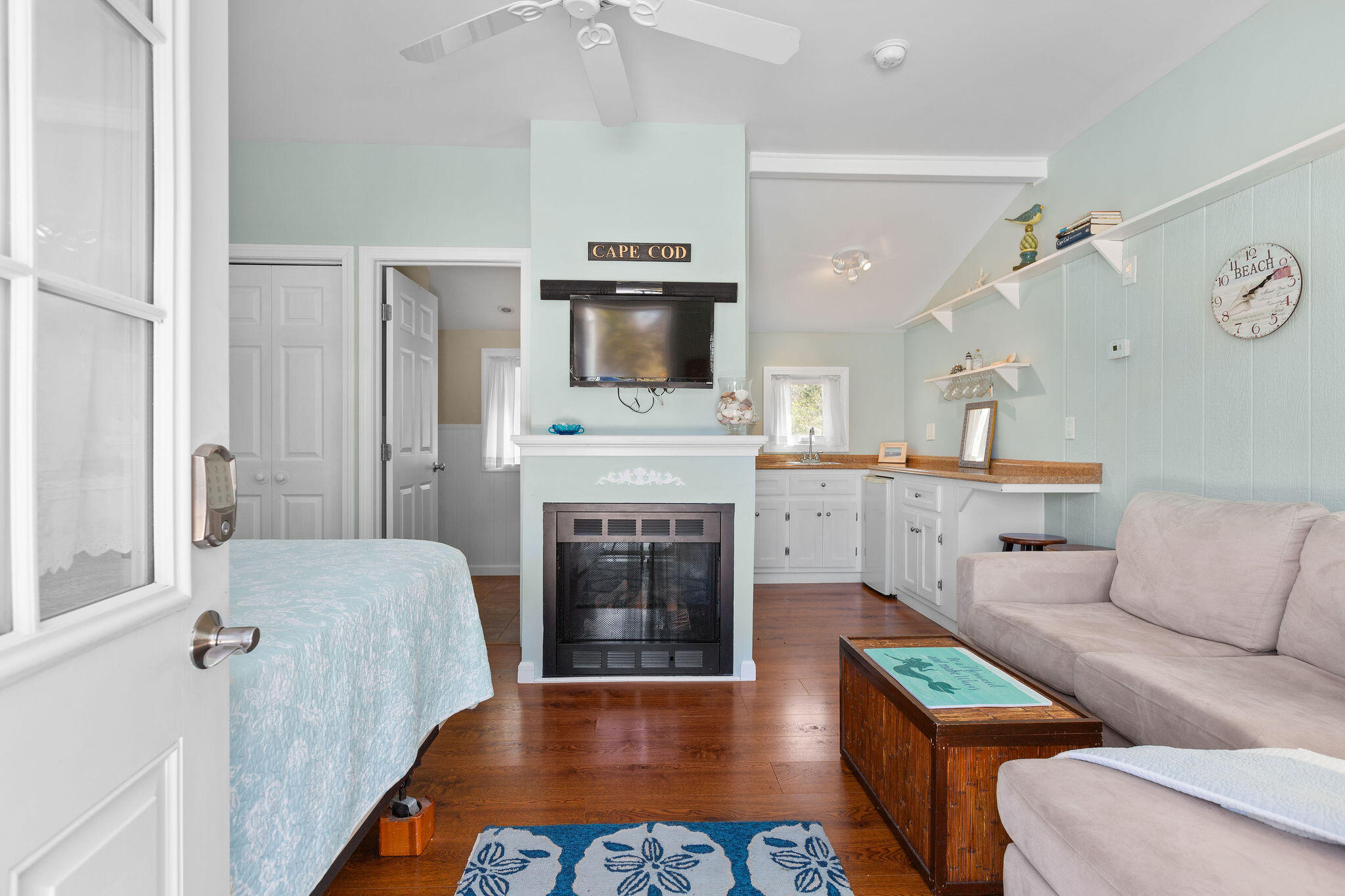 16 Hughes Road Truro, MA 02666 - Photo 37 of 50 a living room with furniture and a fireplace