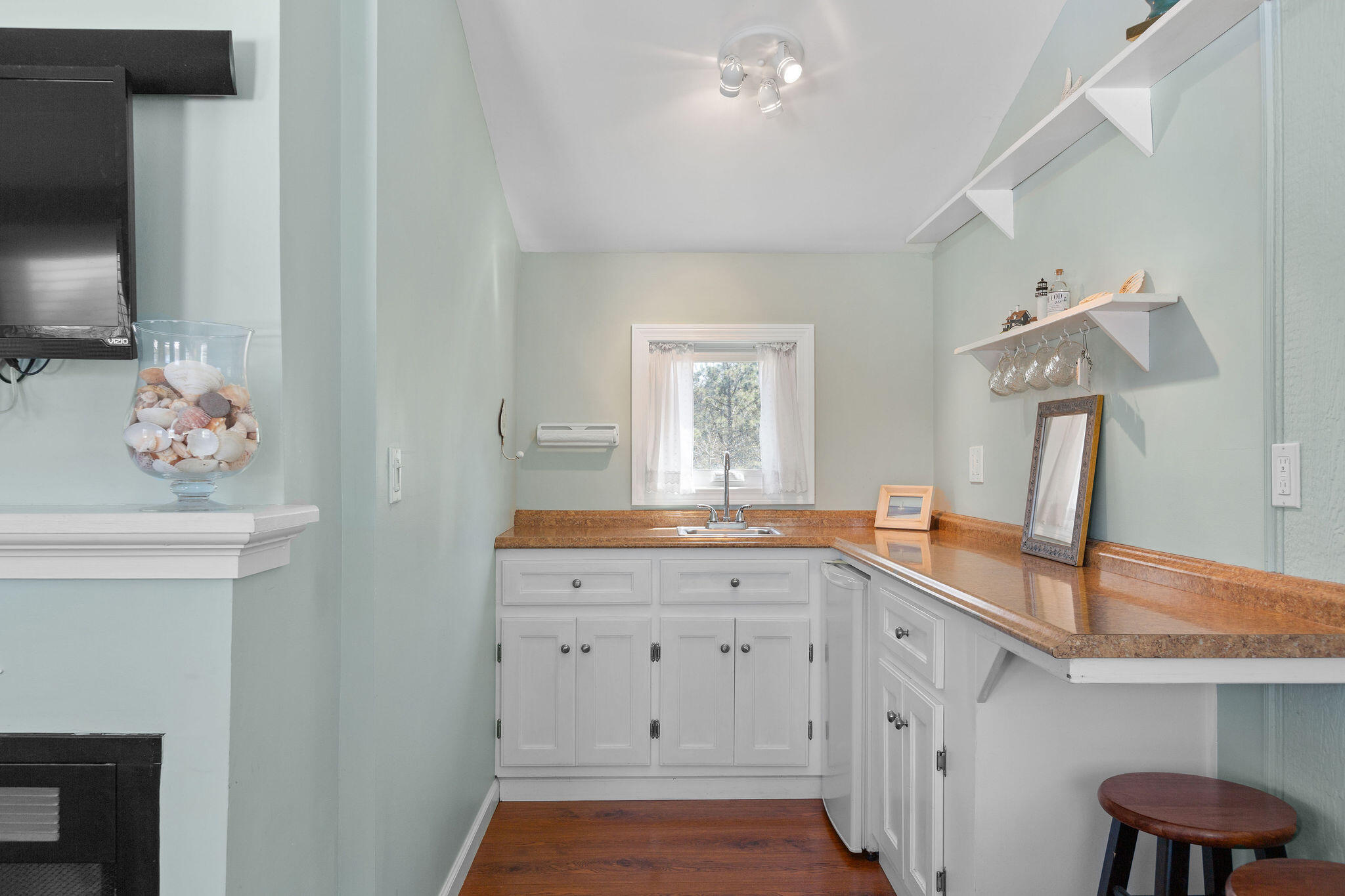 16 Hughes Road Truro, MA 02666 - Photo 40 of 50 a spacious bathroom with a sink and a mirror