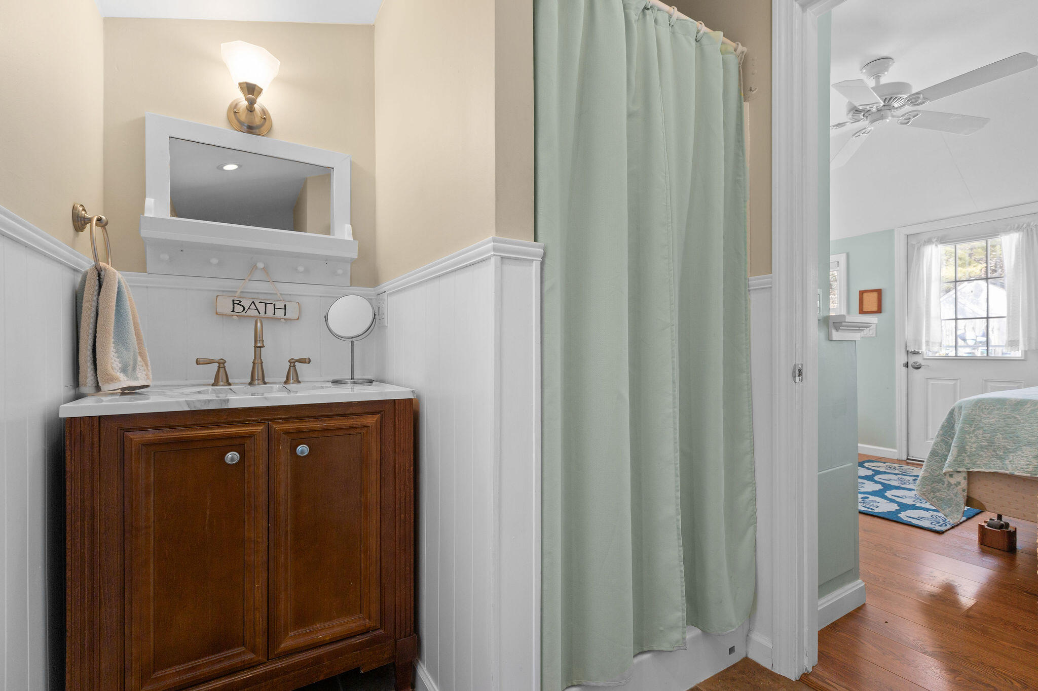 16 Hughes Road Truro, MA 02666 - Photo 41 of 50 a bathroom with a sink a light fixture and a mirror