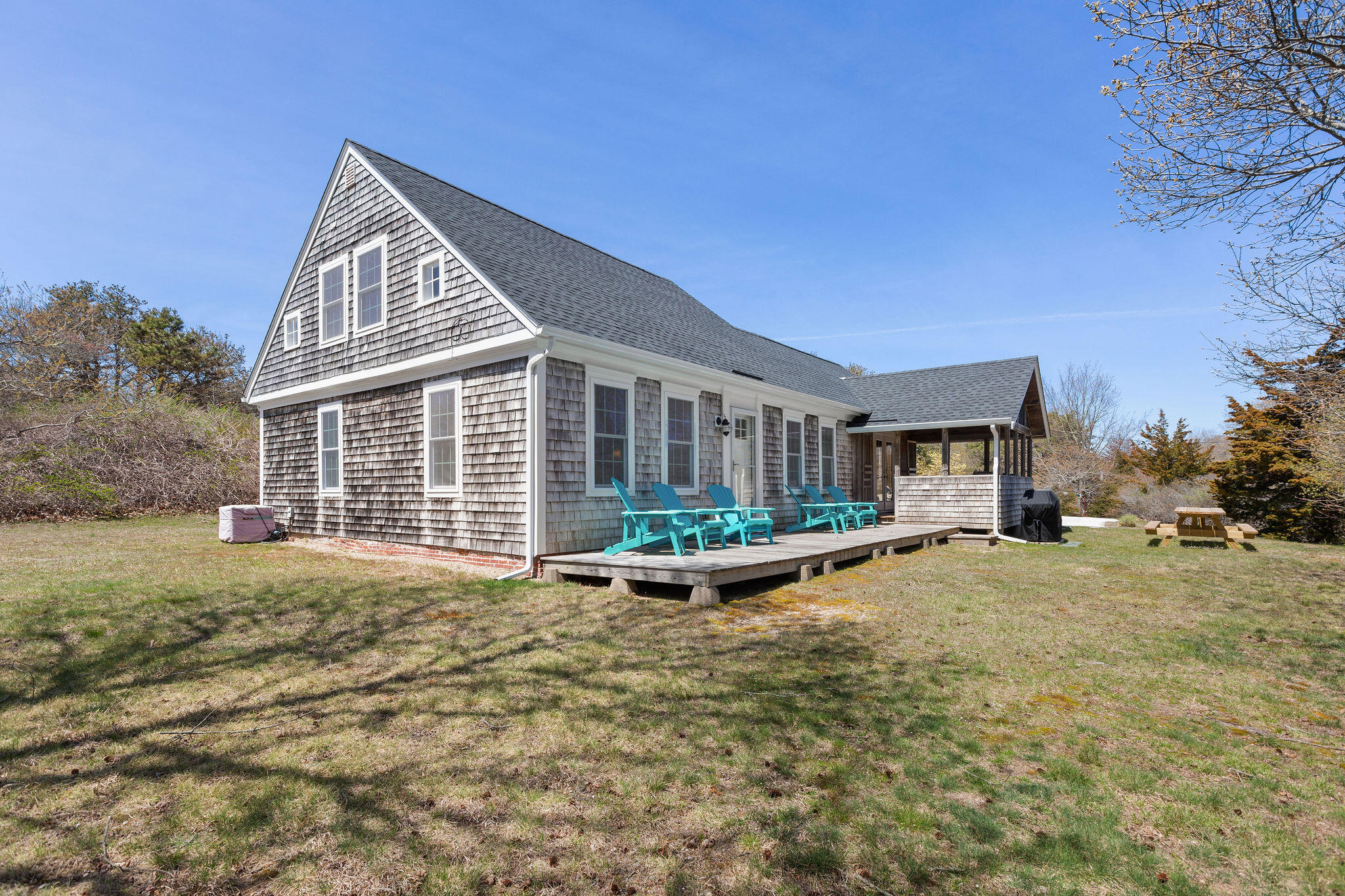 16 Hughes Road Truro, MA 02666 - Photo 8 of 50 a view of a house with a yard and sitting area