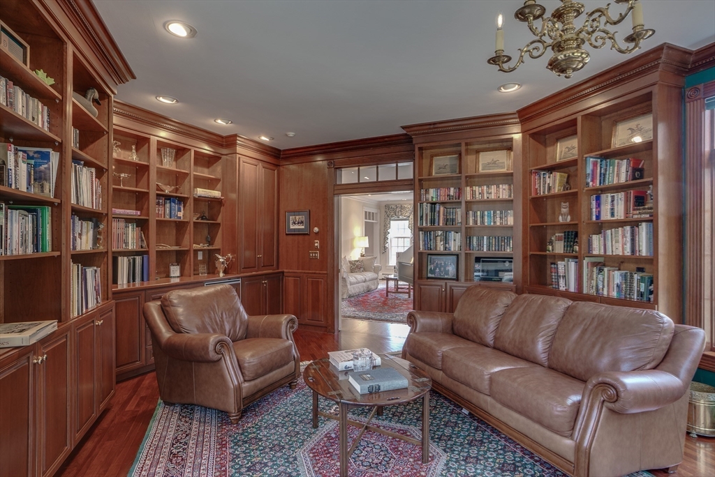 286 Shadyside Avenue Concord, MA 01742 - Photo 11 of 35 a living room with furniture and a book shelf