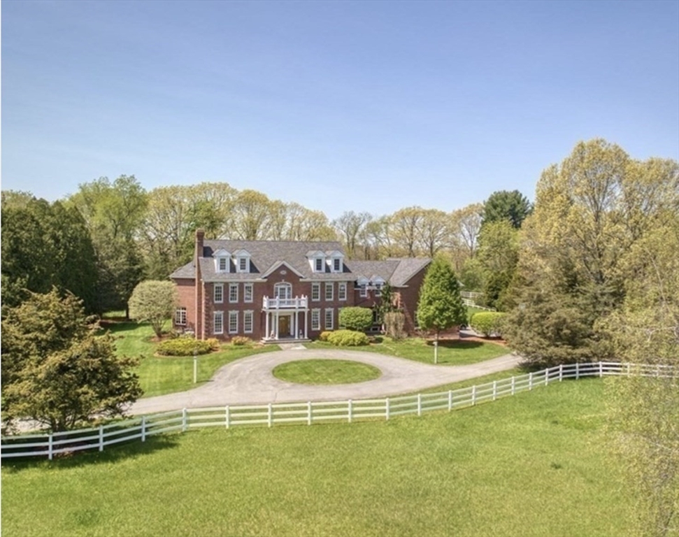 286 Shadyside Avenue Concord, MA 01742 - Photo 2 of 35 a view of a swimming pool with a building in the background