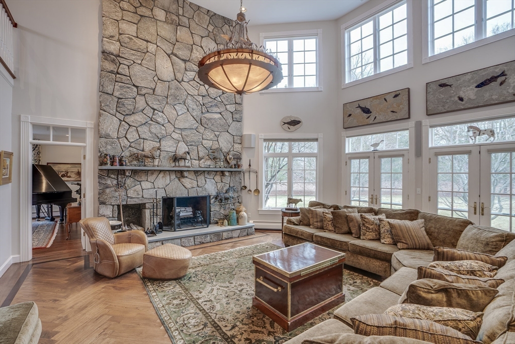 286 Shadyside Avenue Concord, MA 01742 - Photo 5 of 35 a living room with furniture large window and fireplace