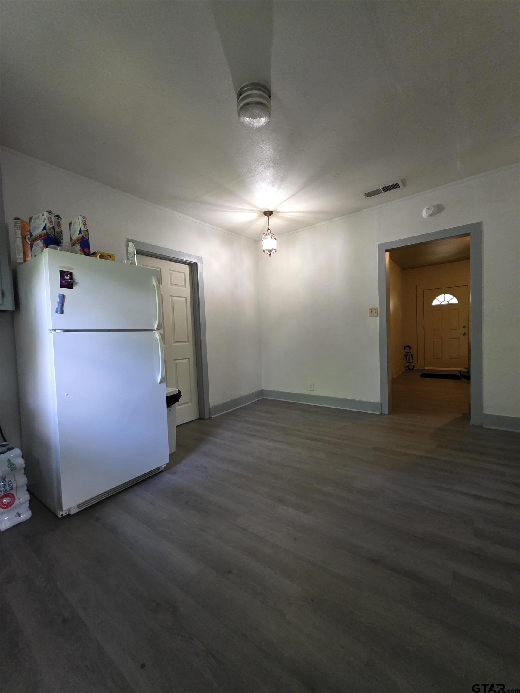 316 North Hospital Street Rusk, TX 75785 - Photo 14 of 21 a view of a livingroom with wooden floor