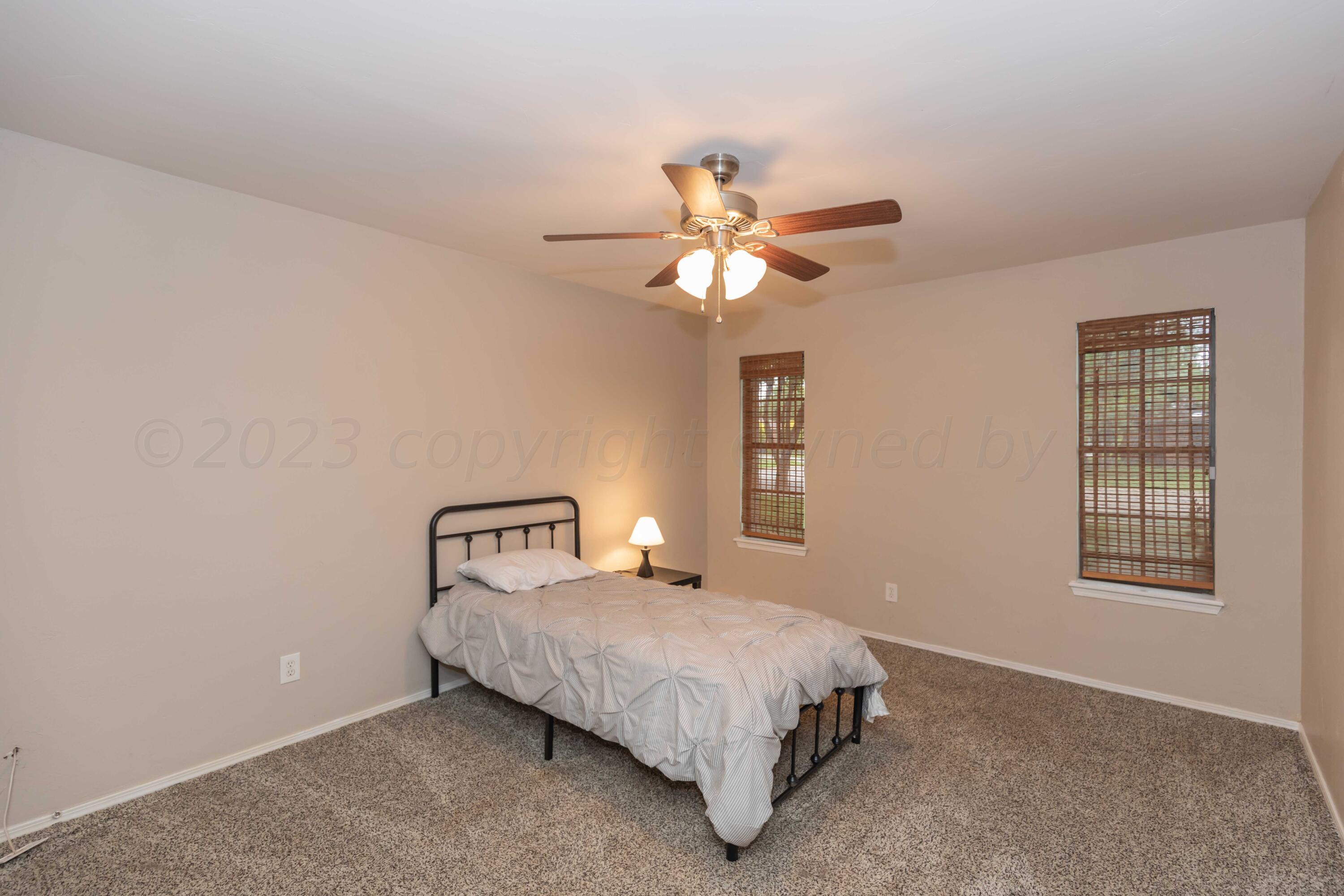 6211 Bayswater Road Amarillo, TX 79109 - Photo 22 of 43 BEDROOM 2 VIEW 1