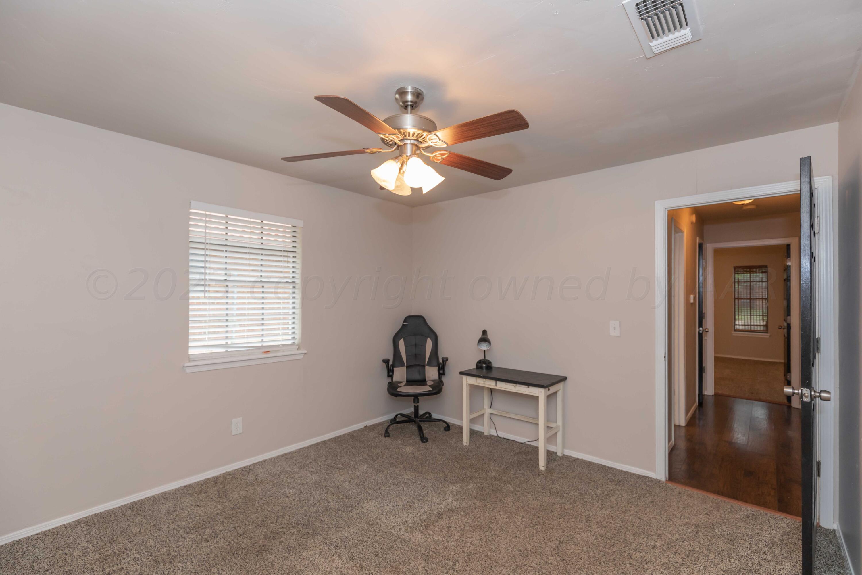 6211 Bayswater Road Amarillo, TX 79109 - Photo 31 of 43 BEDROOM 3 VIEW 2