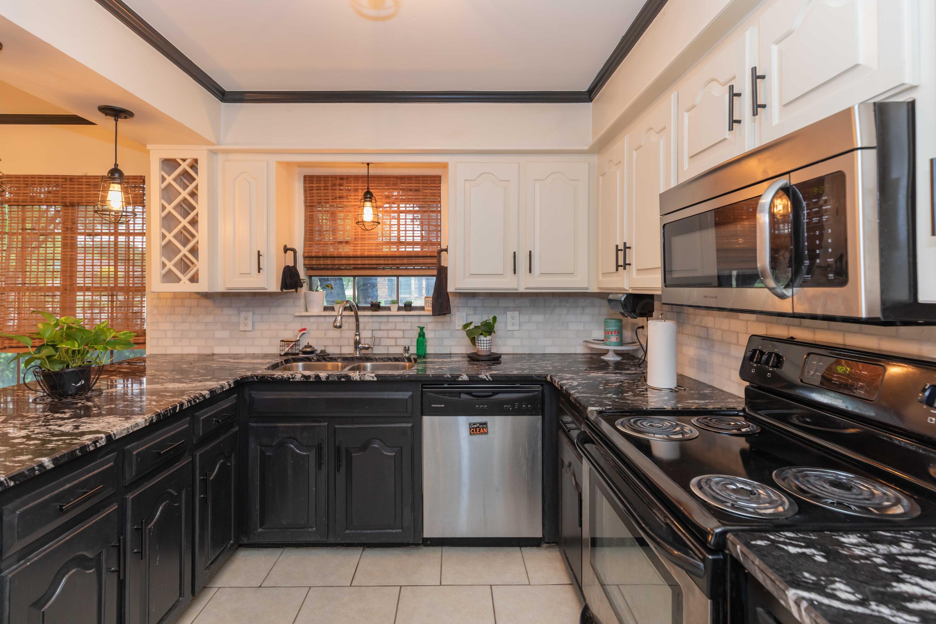 6211 Bayswater Road Amarillo, TX 79109 - Photo 8 of 43 KITCHEN VIEW 2