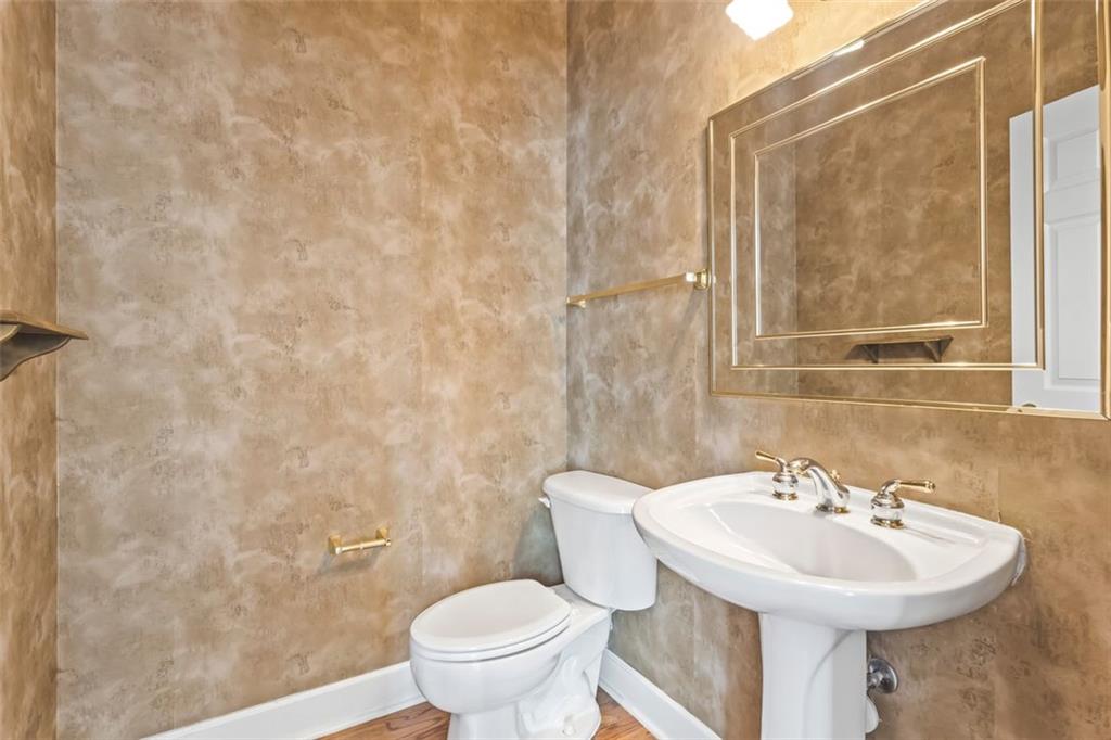 4751 Rosebrook Place Southeast Atlanta, GA 30339 - Photo 21 of 59 a bathroom with a sink and a toilet