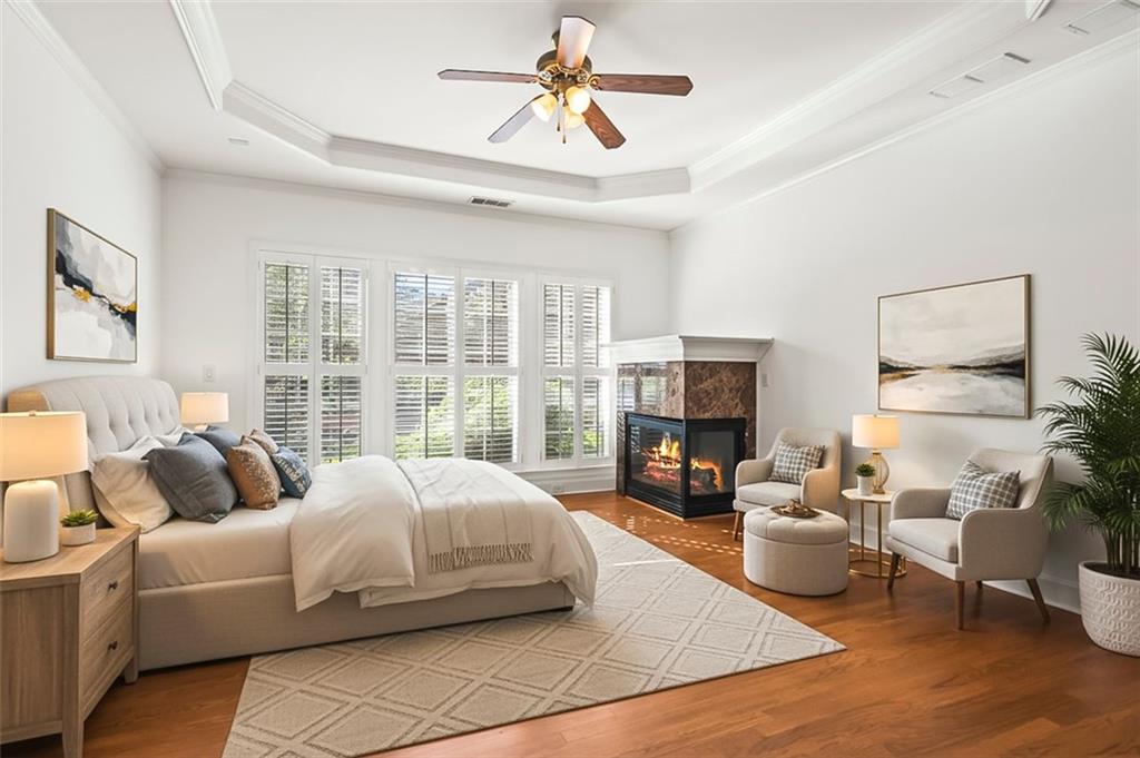 4751 Rosebrook Place Southeast Atlanta, GA 30339 - Photo 22 of 59 a living room with furniture large window and a fireplace