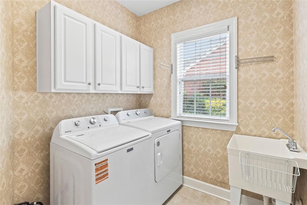 4751 Rosebrook Place Southeast Atlanta, GA 30339 - Photo 30 of 59 a utility room with dryer and washer