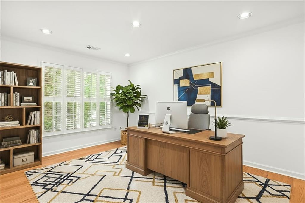 4751 Rosebrook Place Southeast Atlanta, GA 30339 - Photo 38 of 59 a living room with furniture a window and bookshelf