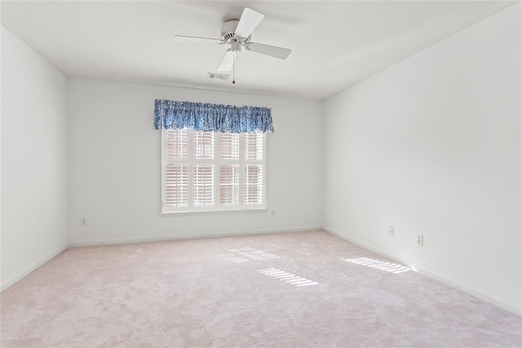 4751 Rosebrook Place Southeast Atlanta, GA 30339 - Photo 45 of 59 an empty room with a window