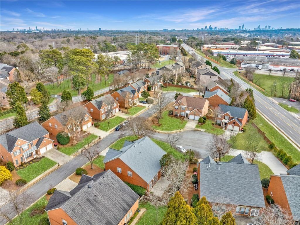 4751 Rosebrook Place Southeast Atlanta, GA 30339 - Photo 57 of 59 an aerial view of residential houses with outdoor space