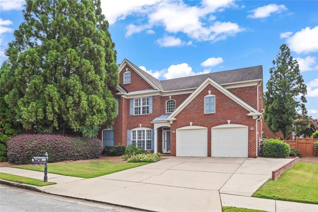 4751 Rosebrook Place Southeast Atlanta, GA 30339 - Photo 59 of 59 a front view of a house with a yard