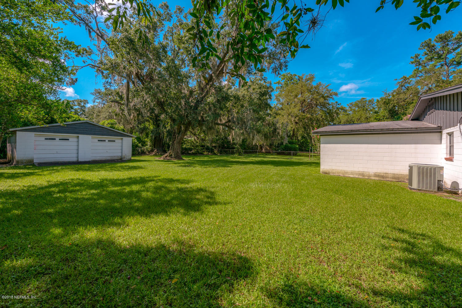 2741 Sunnybrook Road Jacksonville, FL 32216 - Photo 32 of 40 Backyard with Detached Garage